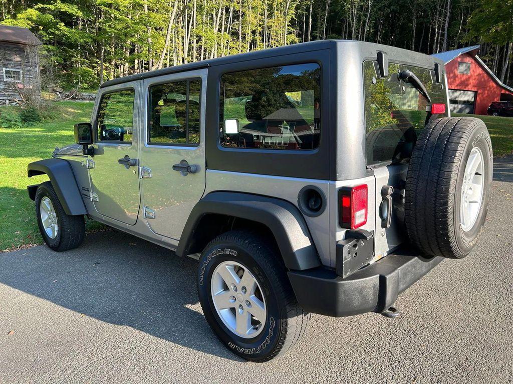 used 2014 Jeep Wrangler Unlimited car, priced at $19,366