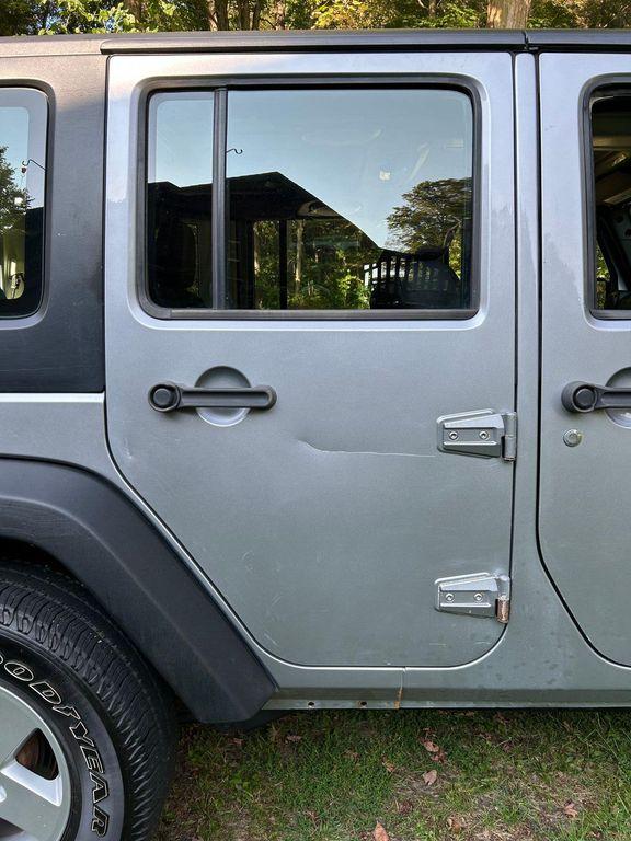 used 2014 Jeep Wrangler Unlimited car, priced at $19,366