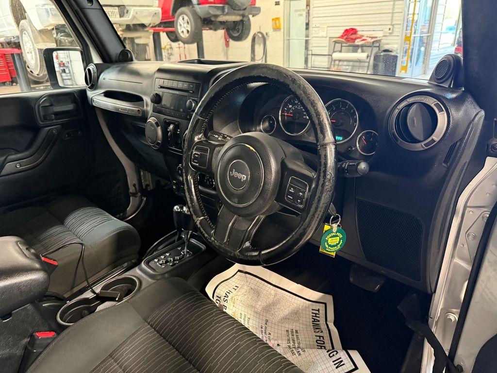 used 2012 Jeep Wrangler Unlimited car, priced at $15,900
