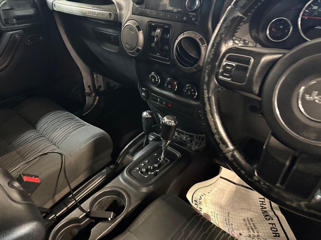 used 2012 Jeep Wrangler Unlimited car, priced at $15,900