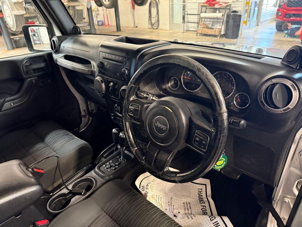 used 2012 Jeep Wrangler Unlimited car, priced at $15,900