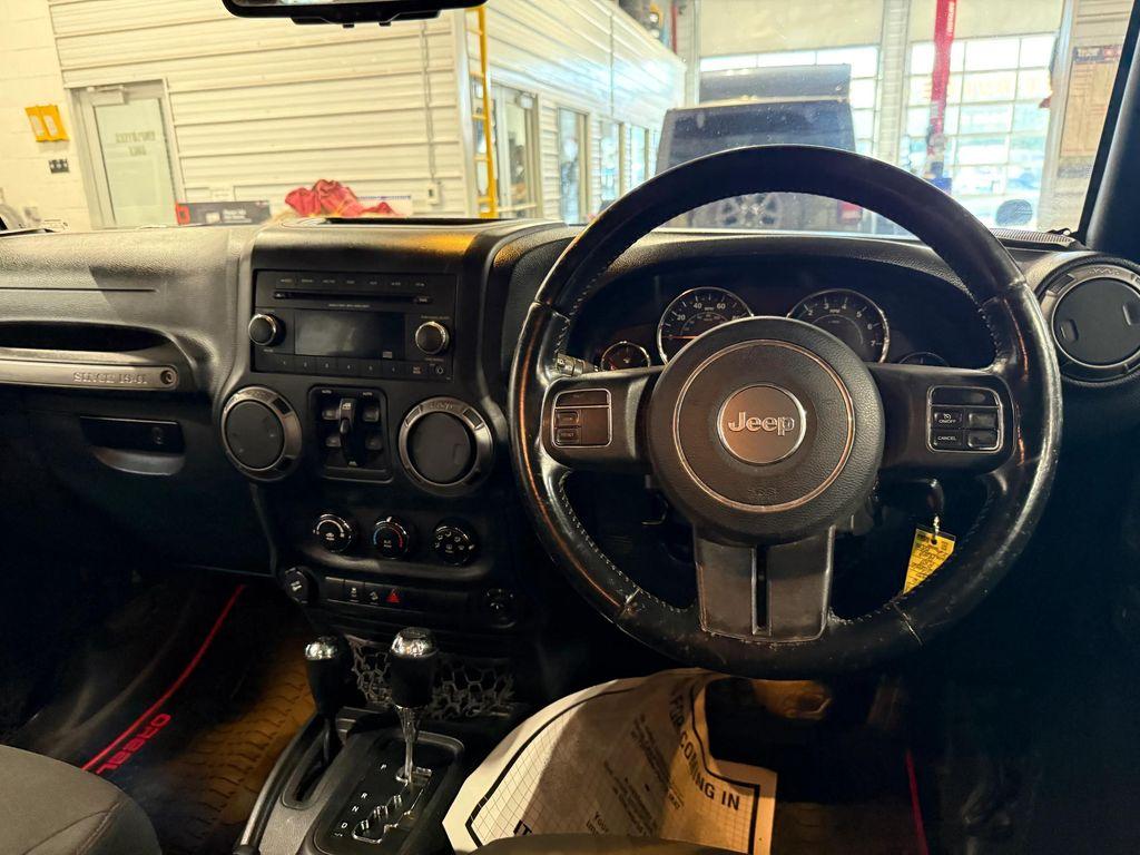 used 2016 Jeep Wrangler Unlimited car, priced at $12,873
