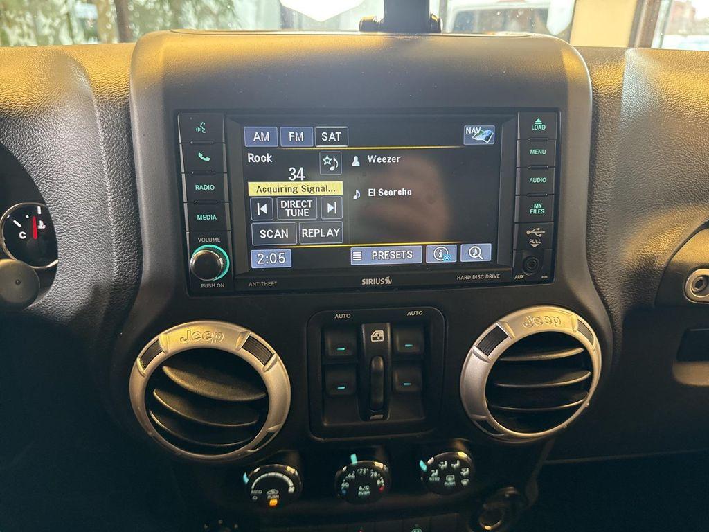 used 2014 Jeep Wrangler Unlimited car, priced at $16,500