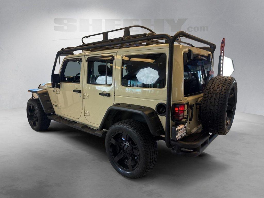 used 2011 Jeep Wrangler Unlimited car, priced at $13,950