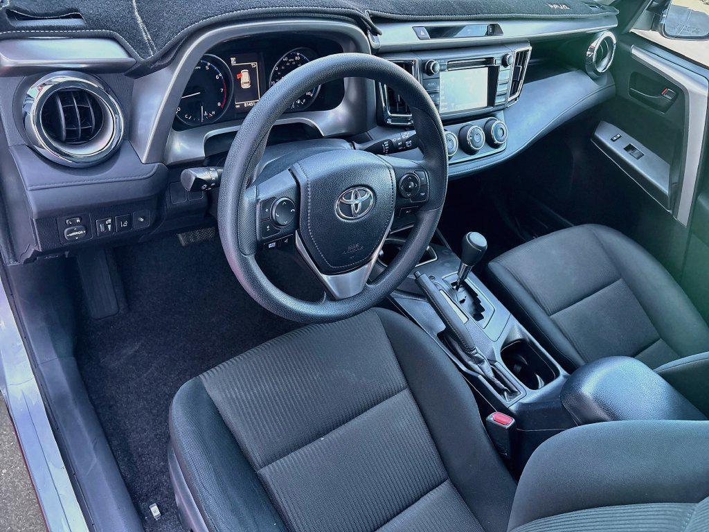 used 2018 Toyota RAV4 car, priced at $19,697