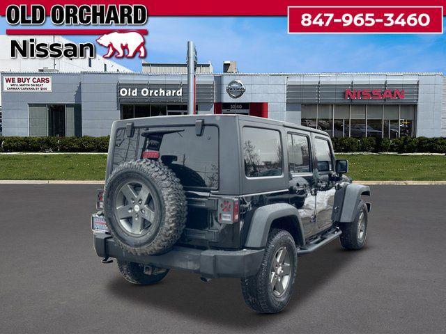 used 2011 Jeep Wrangler Unlimited car, priced at $10,555