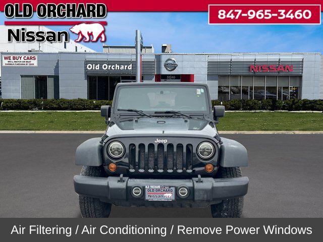 used 2011 Jeep Wrangler Unlimited car, priced at $10,555
