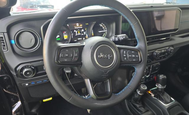 used 2024 Jeep Wrangler 4xe car, priced at $36,190