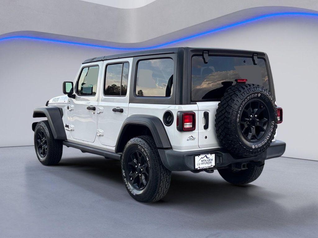 used 2021 Jeep Wrangler Unlimited car, priced at $24,056