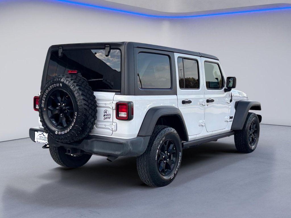 used 2021 Jeep Wrangler Unlimited car, priced at $24,056