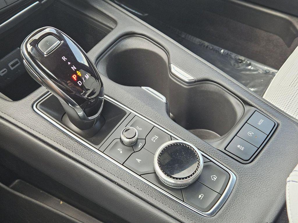 2024 Stellar Black Metallic Cadillac XT4