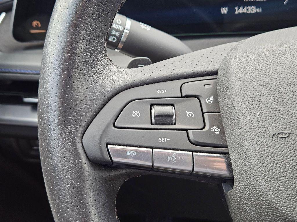 2024 Stellar Black Metallic Cadillac XT4