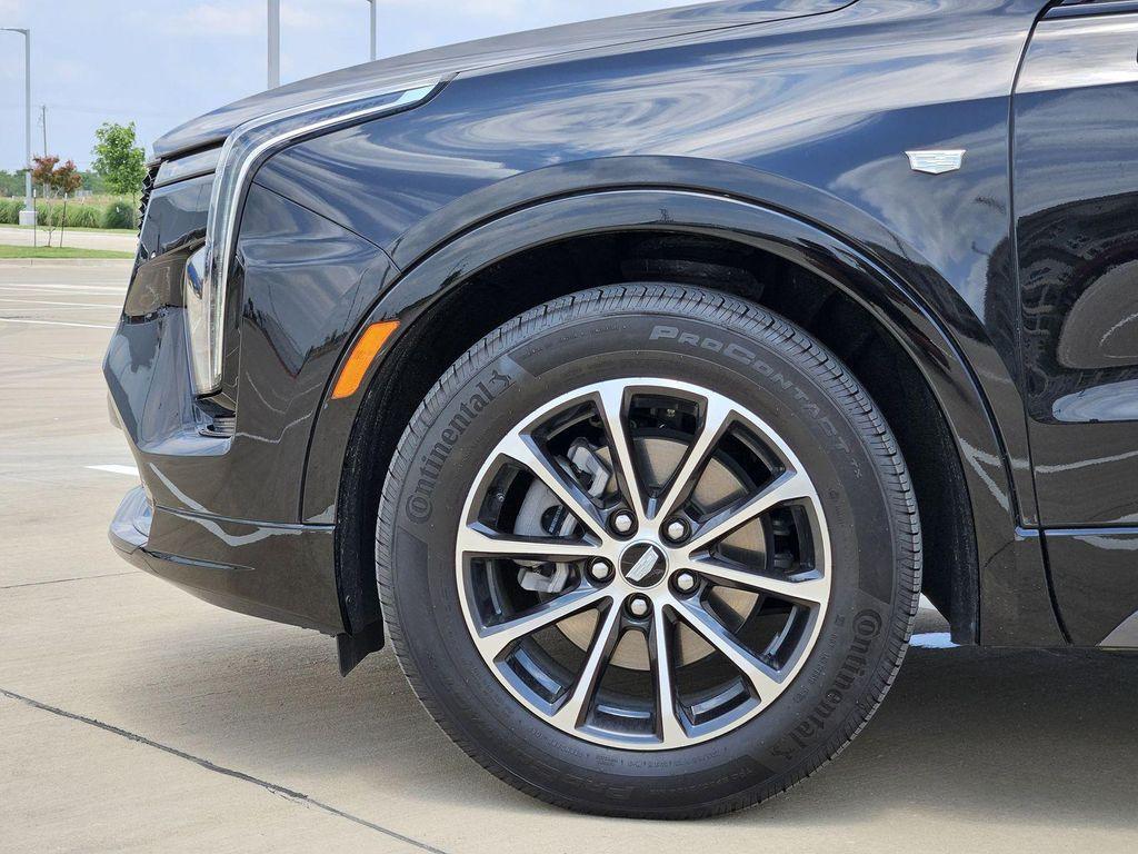 2024 Stellar Black Metallic Cadillac XT4