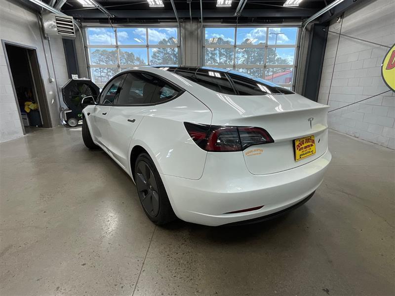 used 2023 Tesla Model 3 car, priced at $22,500