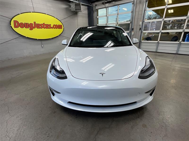 used 2023 Tesla Model 3 car, priced at $18,500