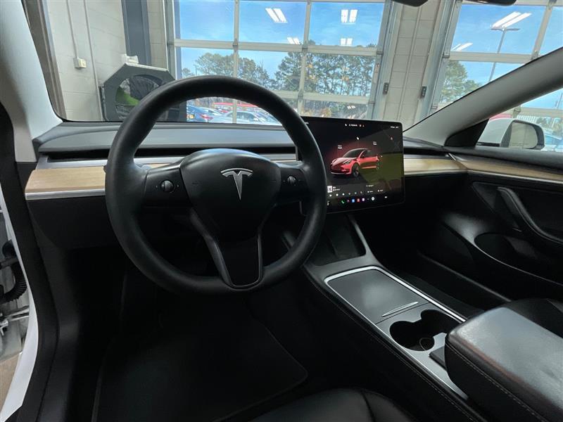 used 2023 Tesla Model 3 car, priced at $18,500