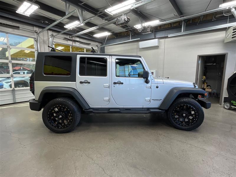 used 2010 Jeep Wrangler Unlimited car, priced at $9,950