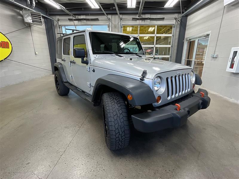 used 2010 Jeep Wrangler Unlimited car, priced at $9,950