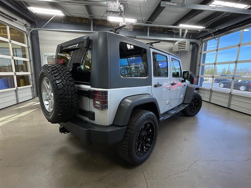 used 2010 Jeep Wrangler Unlimited car, priced at $9,950