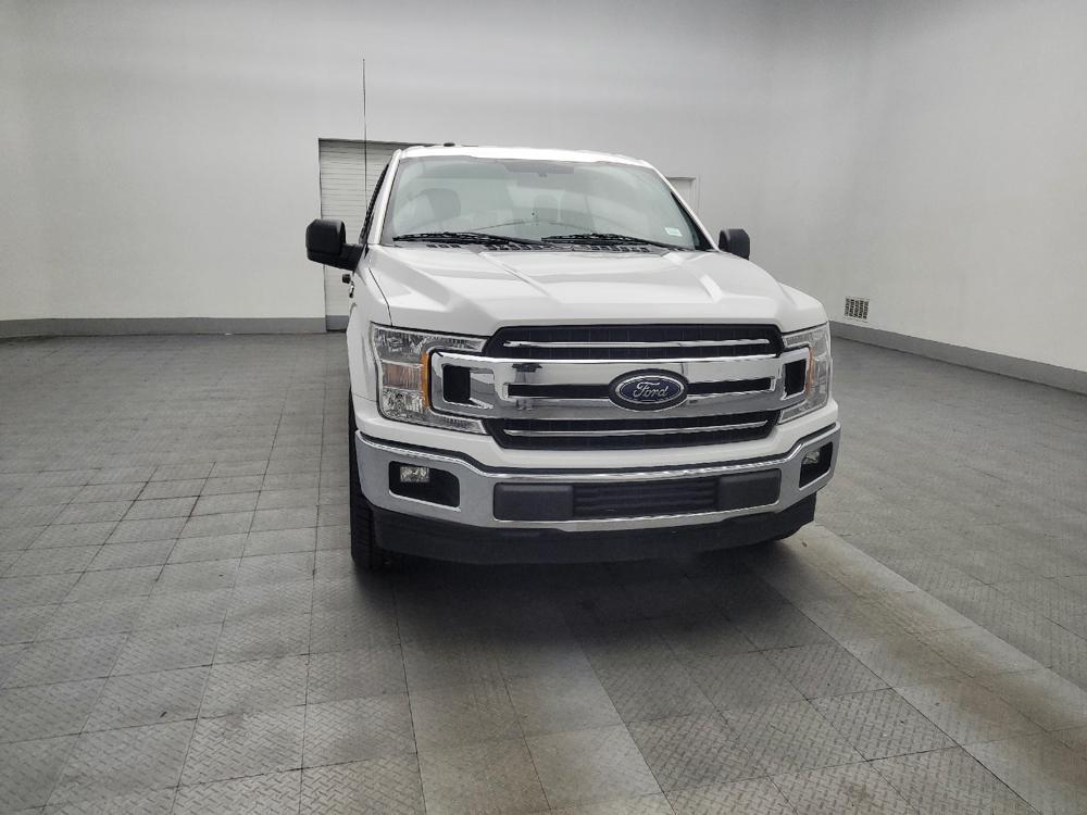 used 2018 Ford F-150 car, priced at $17,995