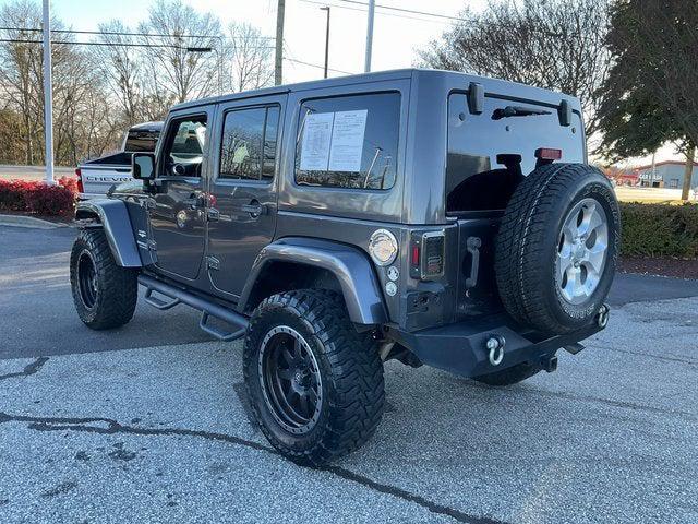 used 2014 Jeep Wrangler Unlimited car, priced at $14,792