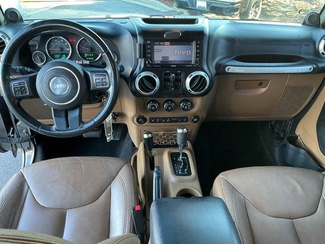 used 2014 Jeep Wrangler Unlimited car, priced at $14,792