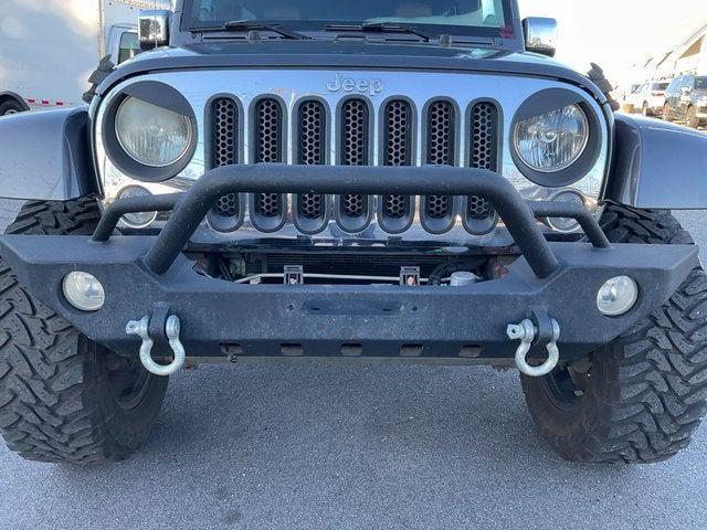 used 2014 Jeep Wrangler Unlimited car, priced at $14,792