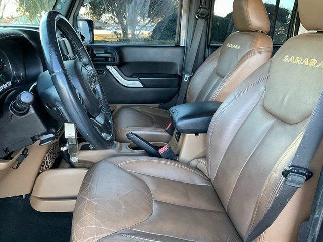 used 2014 Jeep Wrangler Unlimited car, priced at $14,792