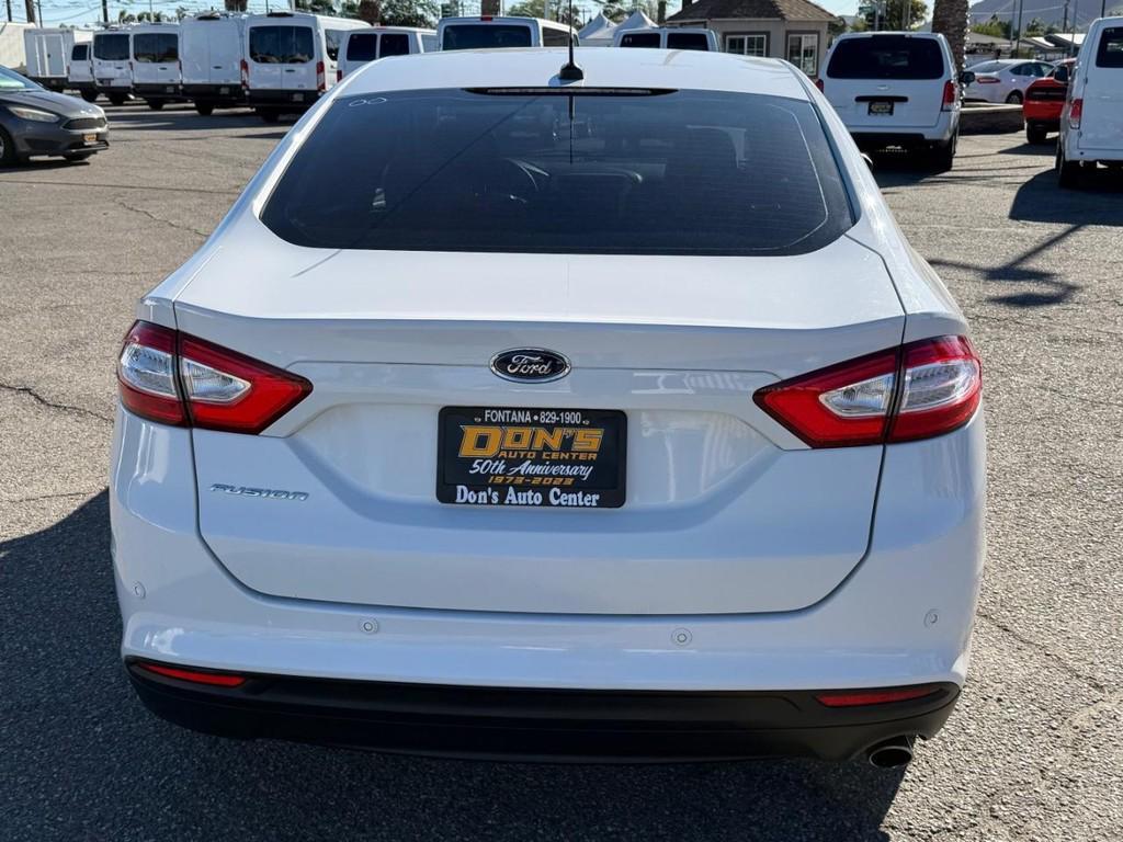 used 2014 Ford Fusion car, priced at $8,999