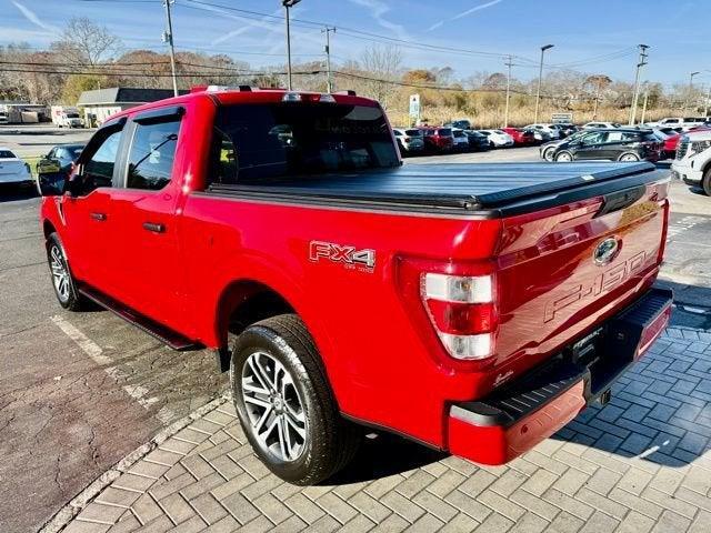 used 2023 Ford F-150 car, priced at $39,874