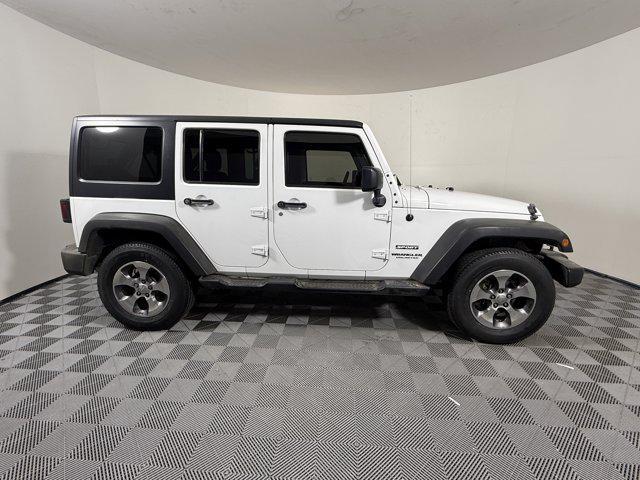 used 2015 Jeep Wrangler Unlimited car, priced at $16,998