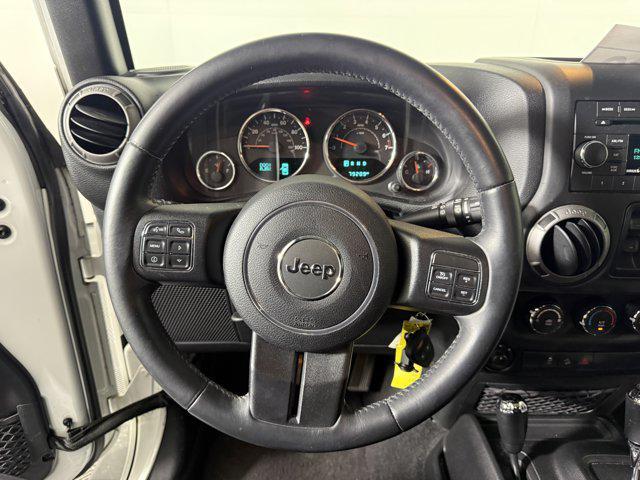 used 2015 Jeep Wrangler Unlimited car, priced at $16,998