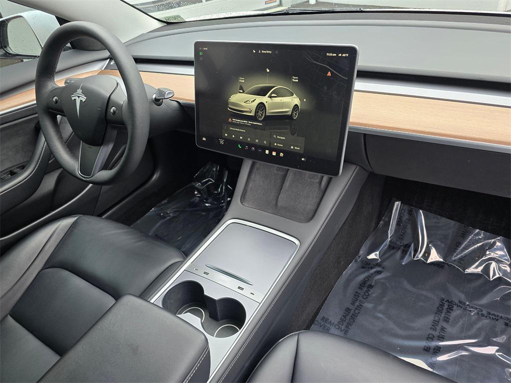 used 2023 Tesla Model 3 car, priced at $22,500