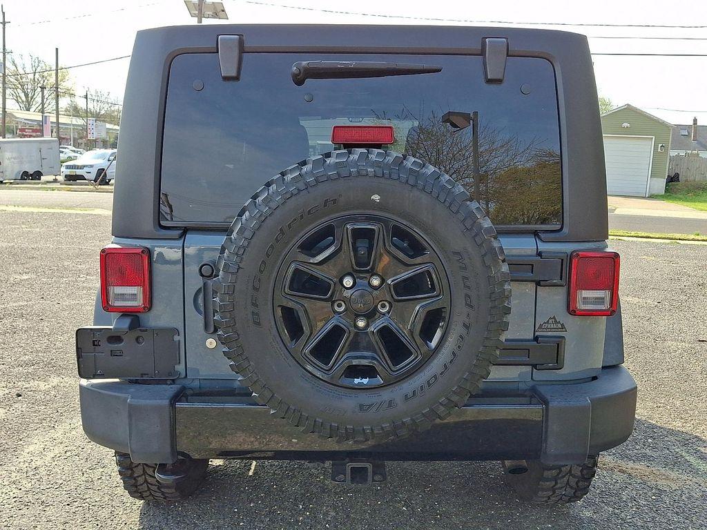 used 2014 Jeep Wrangler Unlimited car, priced at $17,507