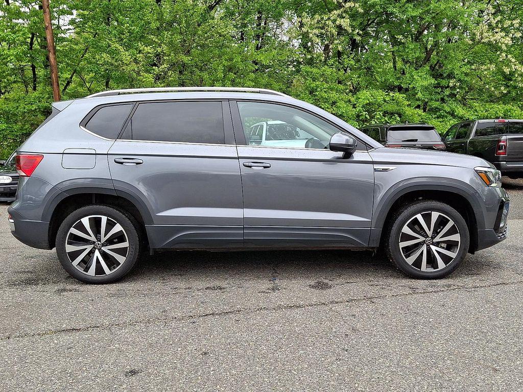 used 2024 Volkswagen Taos car, priced at $19,888