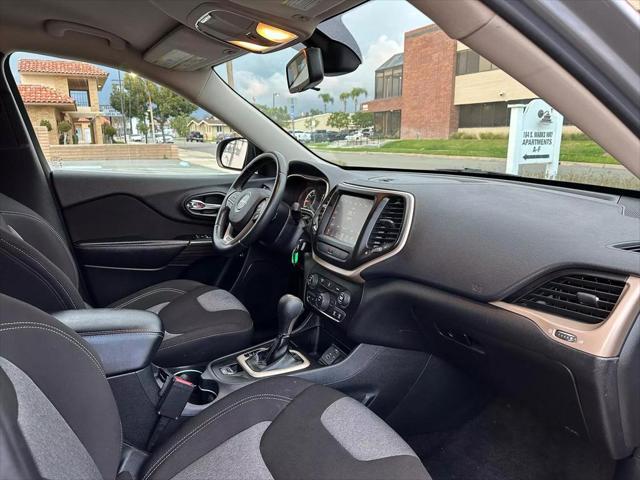 used 2014 Jeep Cherokee car, priced at $8,999