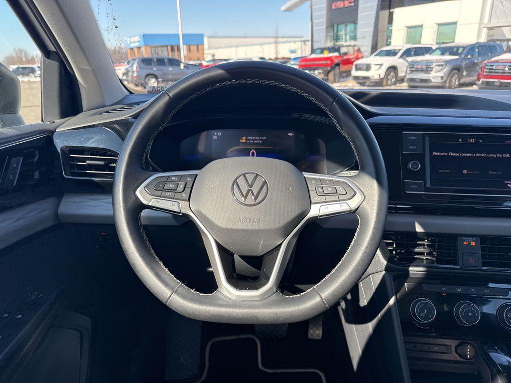 used 2023 Volkswagen Taos car, priced at $18,220