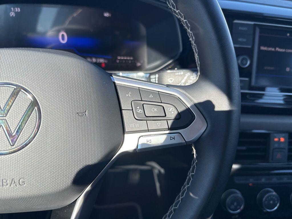 used 2023 Volkswagen Taos car, priced at $18,220