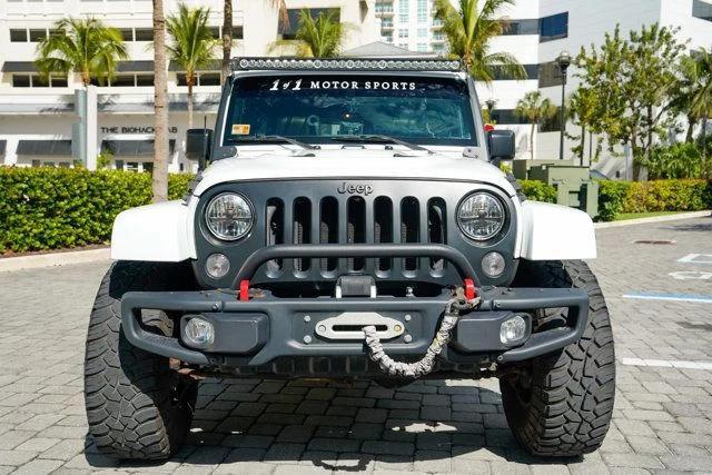used 2016 Jeep Wrangler Unlimited car, priced at $31,988
