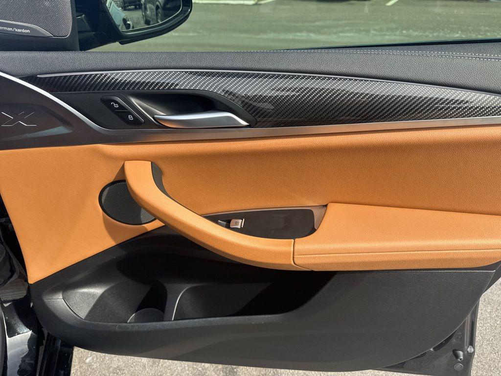 used 2024 BMW X4 car, priced at $56,000