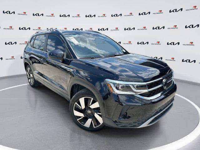 used 2024 Volkswagen Taos car, priced at $23,639