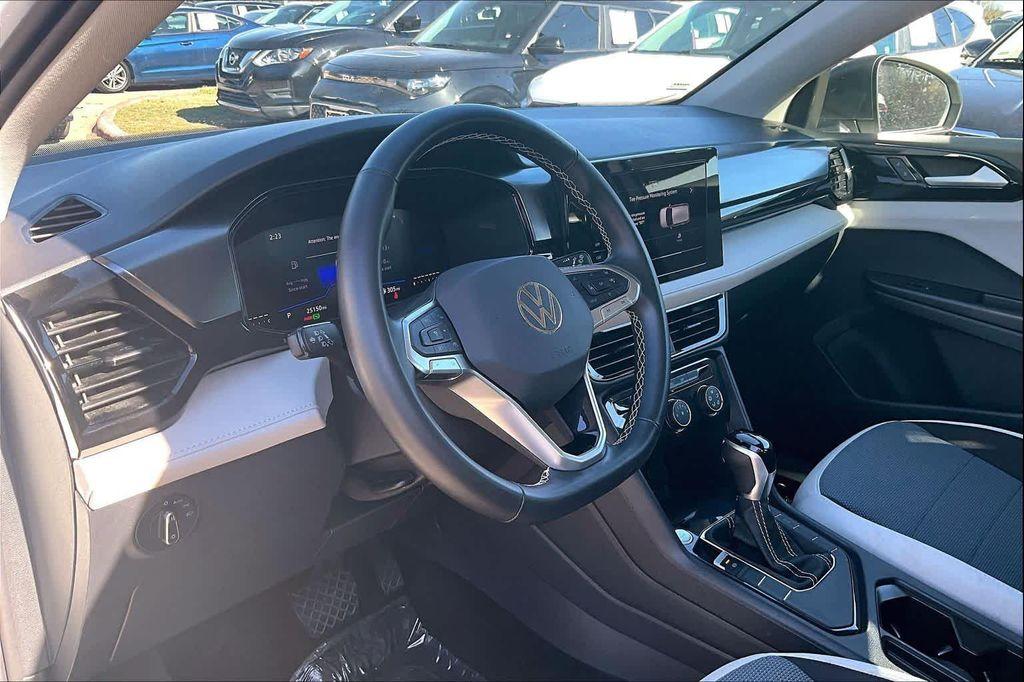 used 2025 Volkswagen Taos car, priced at $22,885