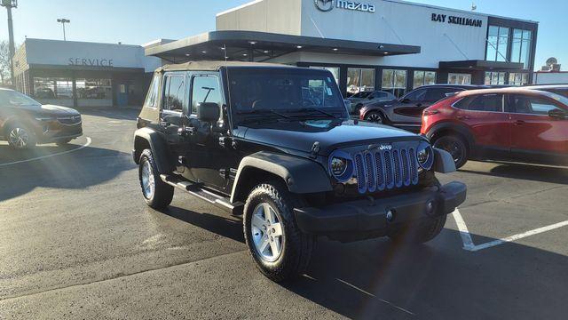 used 2014 Jeep Wrangler Unlimited car, priced at $15,998