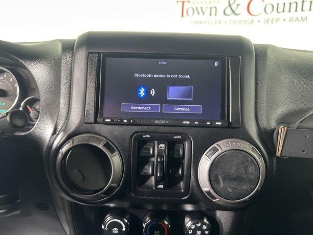 used 2015 Jeep Wrangler Unlimited car, priced at $18,607