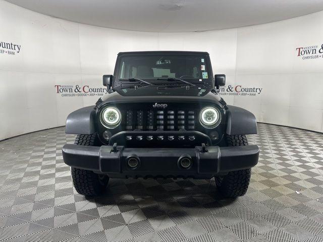 used 2015 Jeep Wrangler Unlimited car, priced at $18,607