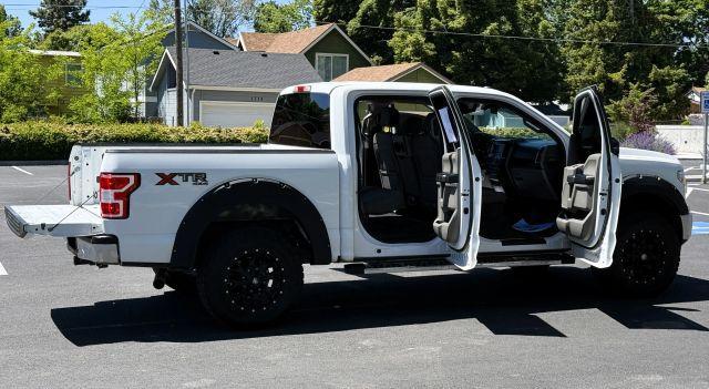 used 2018 Ford F-150 car, priced at $22,419