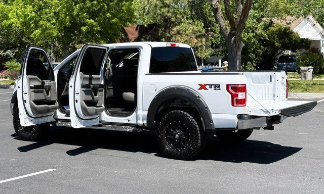 used 2018 Ford F-150 car, priced at $22,419