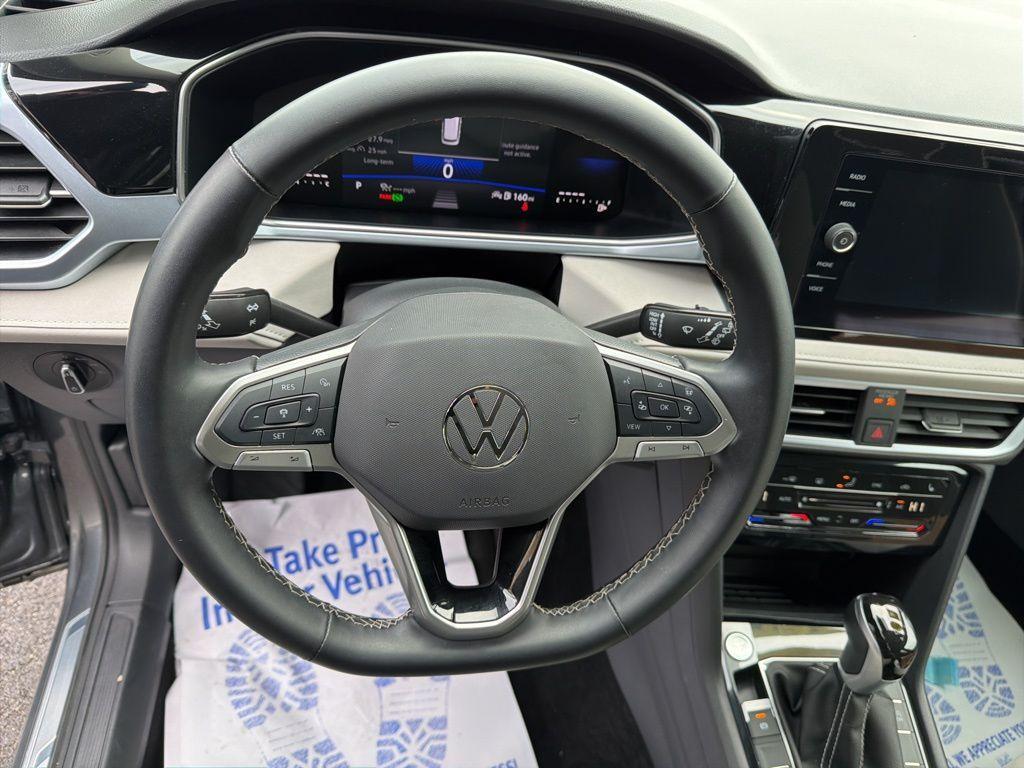 used 2025 Volkswagen Taos car, priced at $22,803