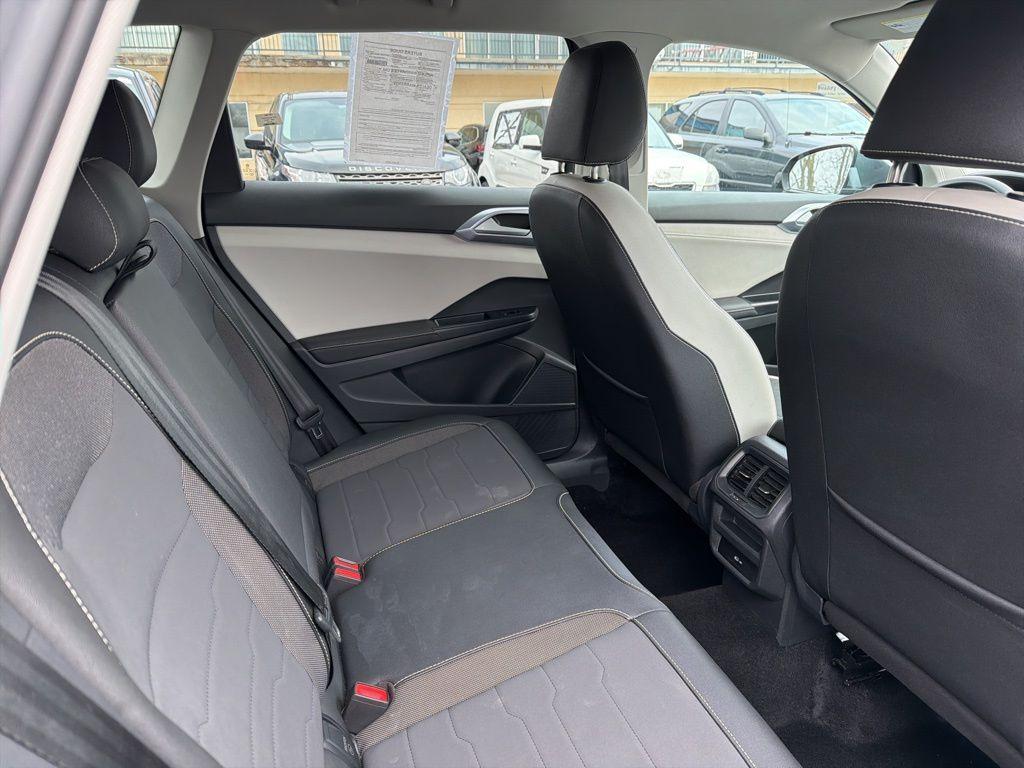 used 2025 Volkswagen Taos car, priced at $22,803