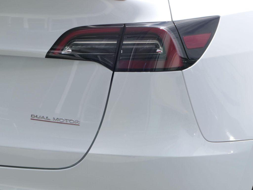 used 2024 Tesla Model Y car, priced at $37,995